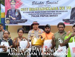 Polda Papua Barat Rayakan Hari Bhayangkara ke-78 dengan Kegiatan Sosial di Kampung Warkwandi