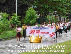 Polres Teluk Wondama Gelar Jalan Sehat Sambut Hari Bhayangkara ke-79